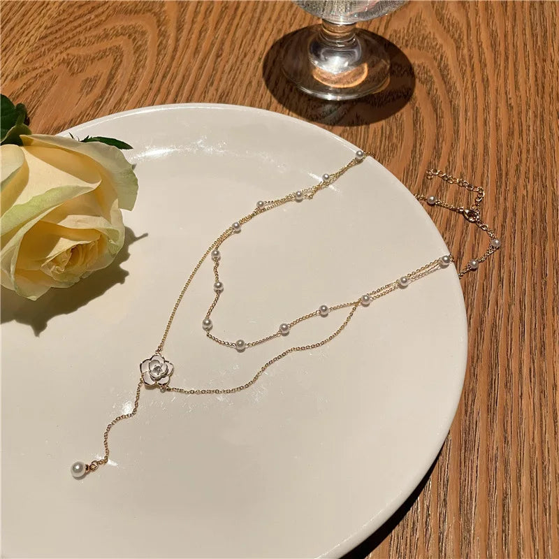 Elegant Double Tassel Pearl Camellia Necklace - Unique Design